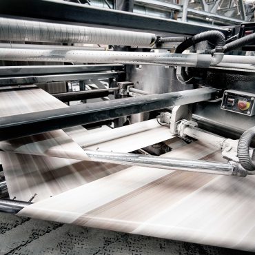 speed-of-offset-print-press-at-work-PUBW2WM.jpg